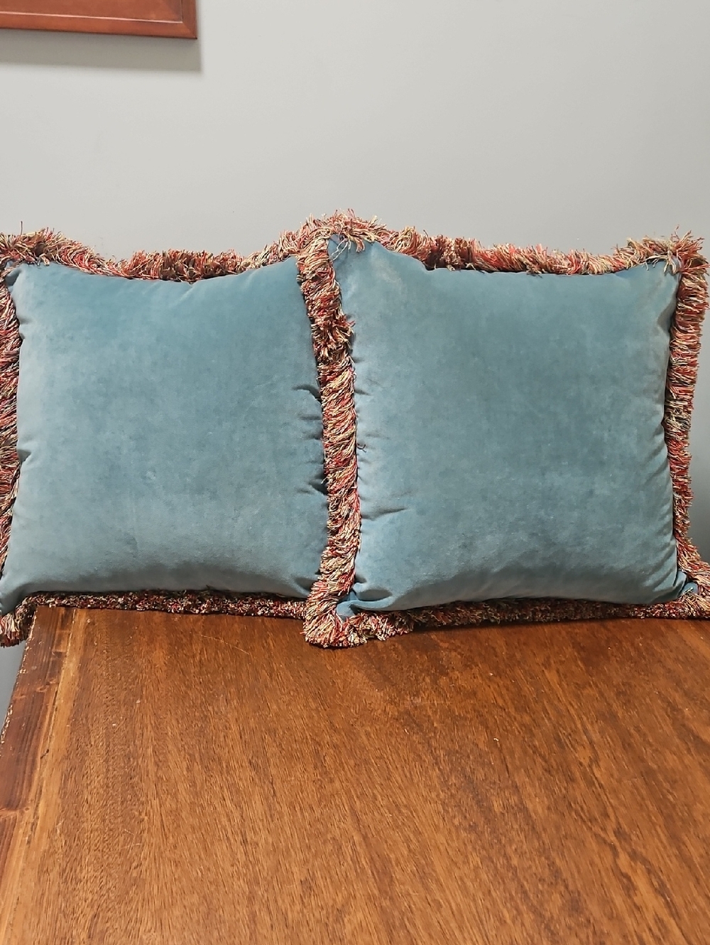 Teal Velvet Throw Pillows with Multicolor Fringe